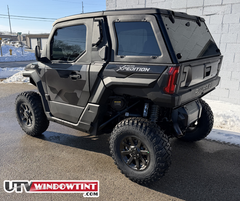 Polaris Xpedition ADV window tint — driver side door close-up