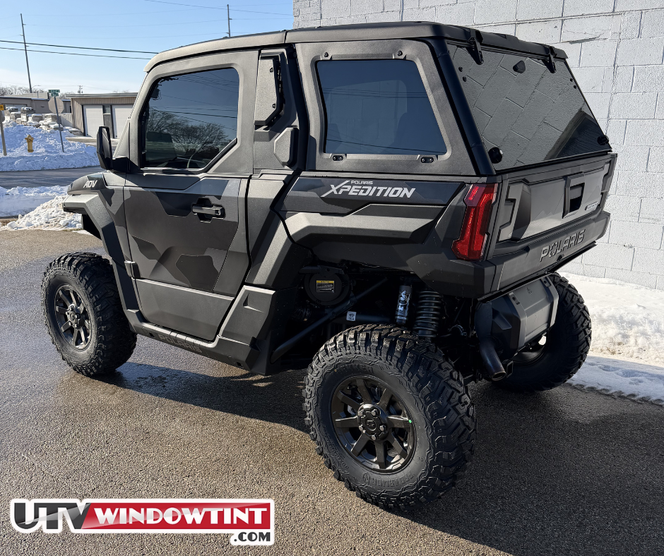 Polaris Xpedition ADV window tint — driver side door close-up