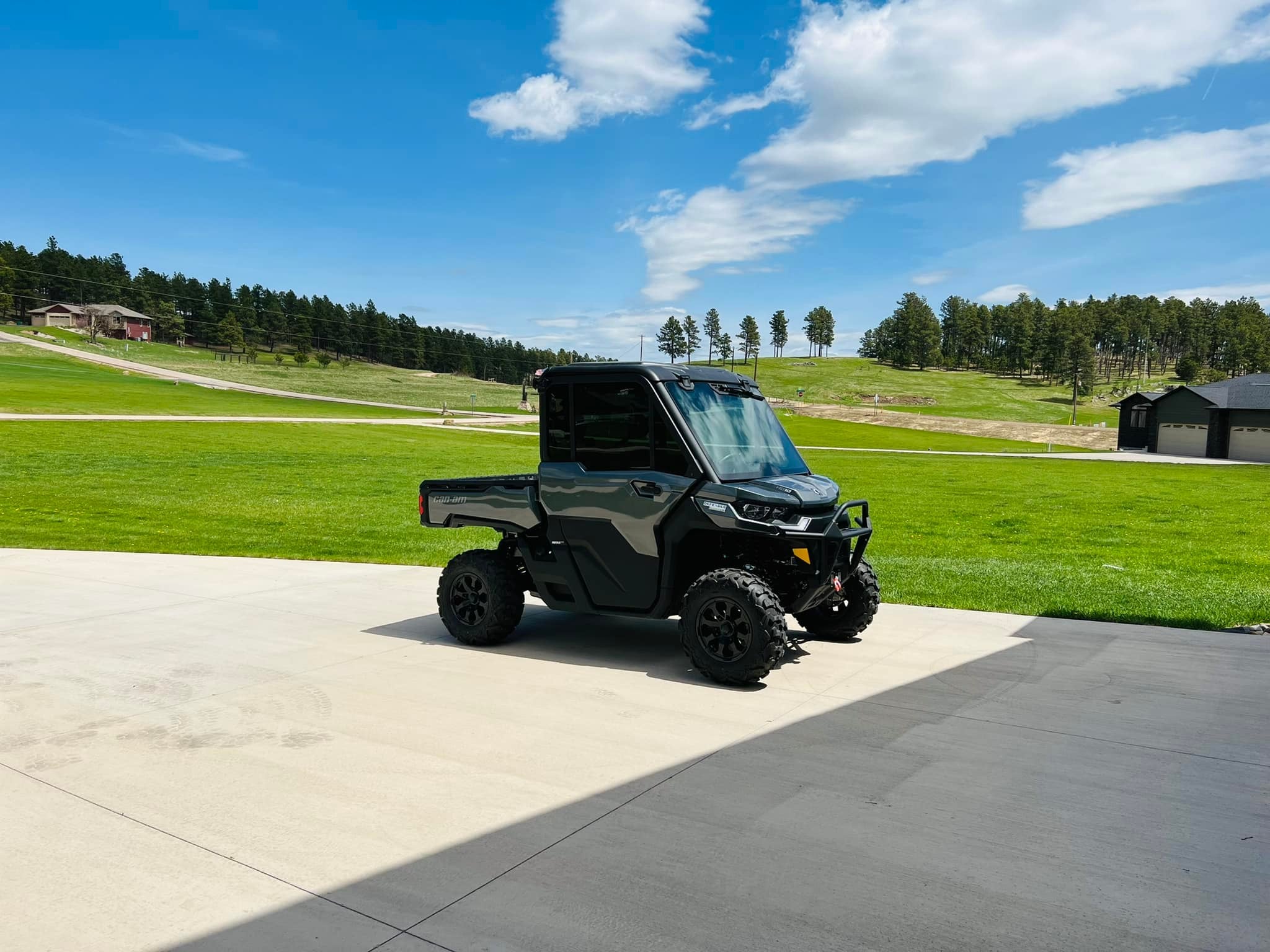 Can-Am Defender HD10 window tint installed — passenger side view