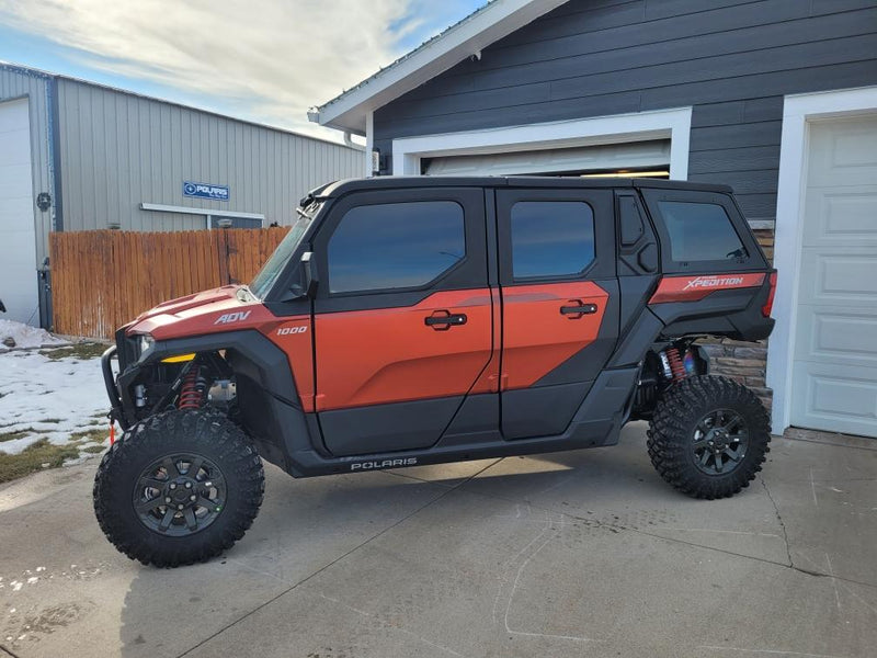 Polaris Xpedition ADV5 window tint — driver side door close-up
