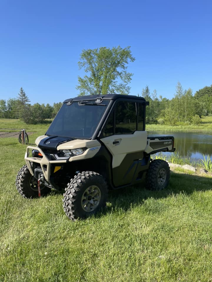 Pre-cut Can-Am Defender HD10 tint kit — all pieces laid out, 2-door